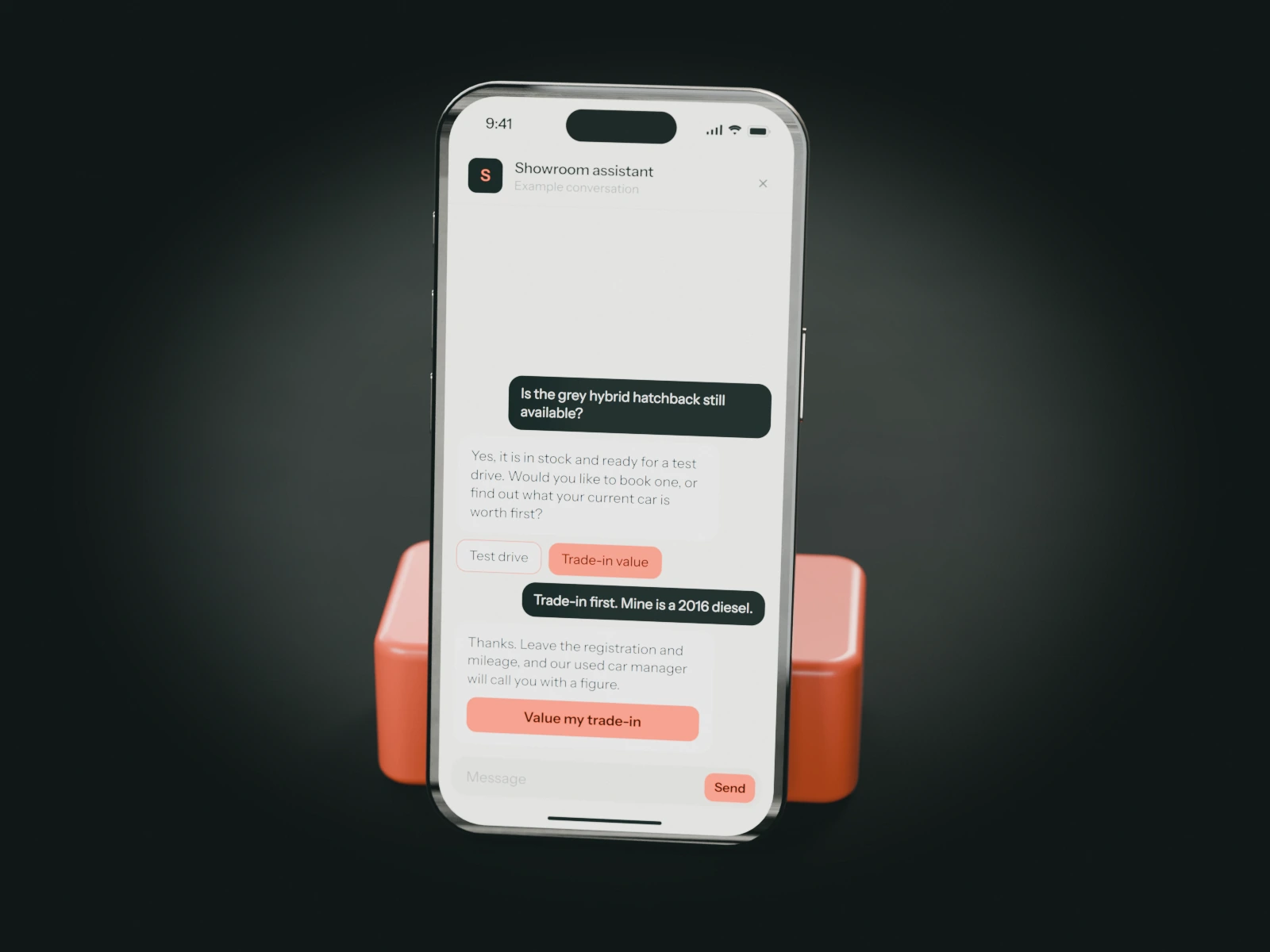 A phone on a coral stand showing an example chat with a car dealership's showroom assistant: a buyer checks that a hybrid hatchback is in stock and asks what their own car is worth.