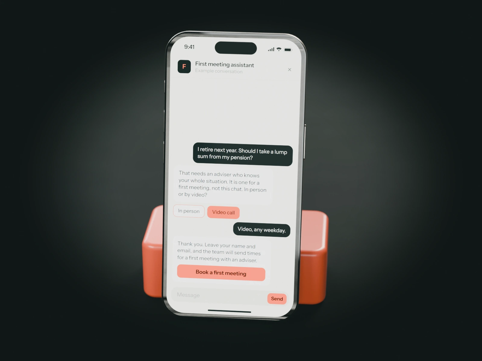 A phone on a coral stand showing an example chat with a financial adviser's first meeting assistant: someone retiring next year asks about taking a lump sum and is offered a first meeting.