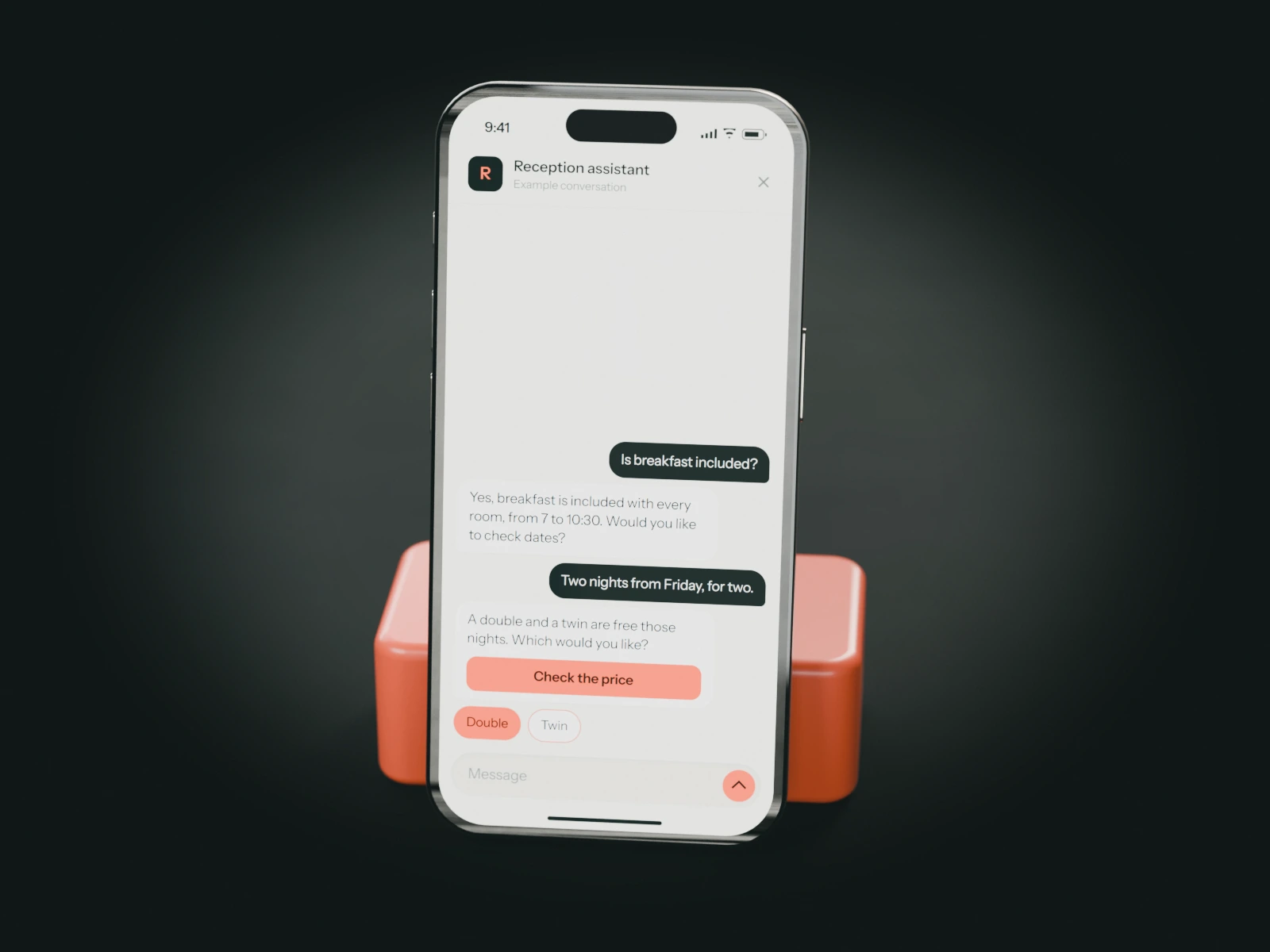 A phone on a coral stand showing an example chat with a guesthouse's reception assistant: a guest asks about breakfast and two nights from Friday.