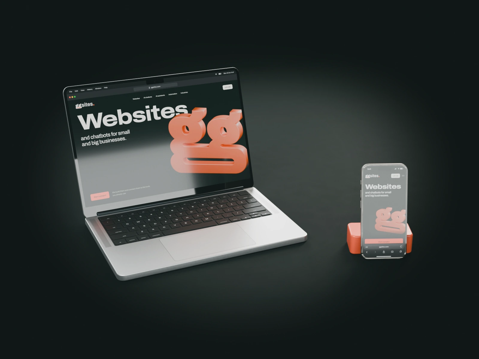 The GGSites homepage on a laptop and on a phone, rendered on a dark studio table.